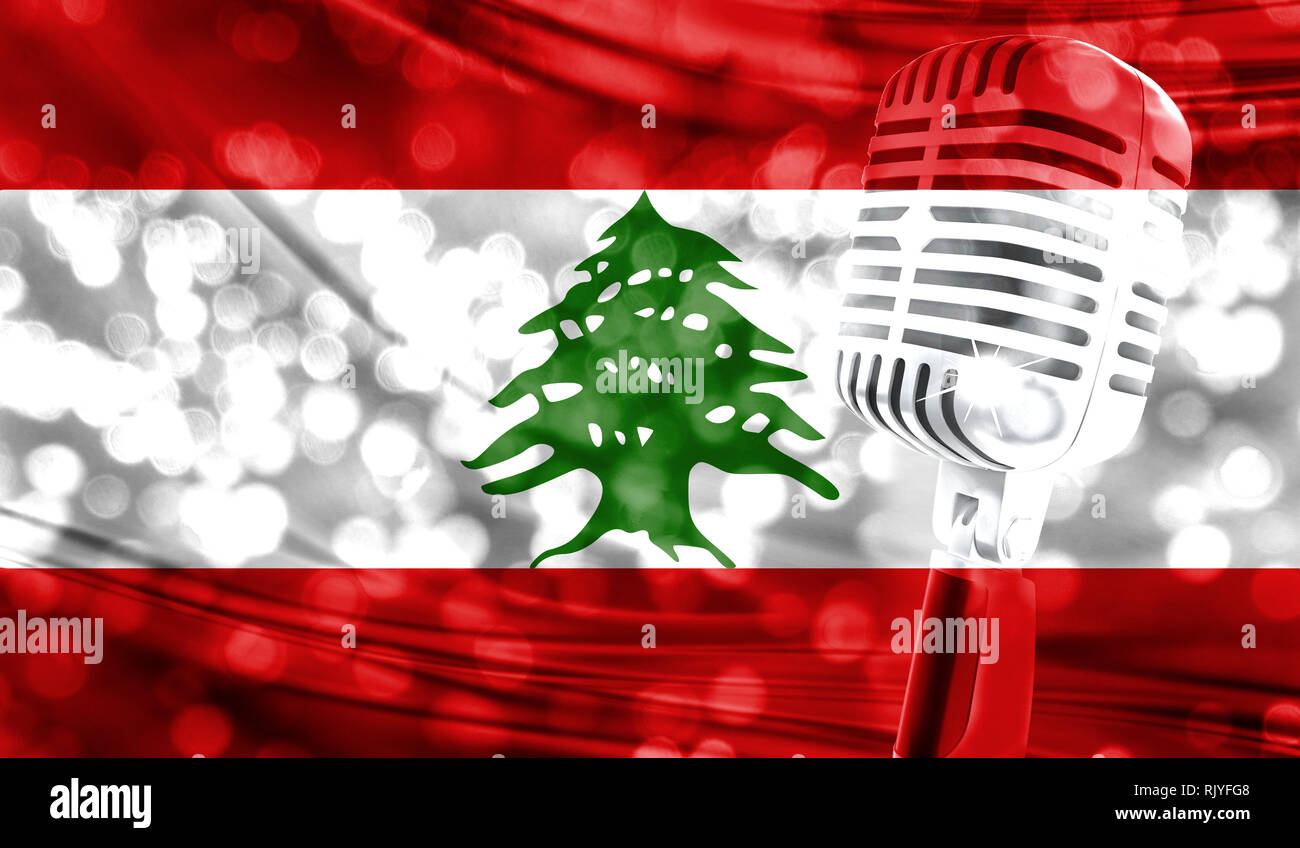 Microphone on a background of a blurry Lebanon flag closeup Stock