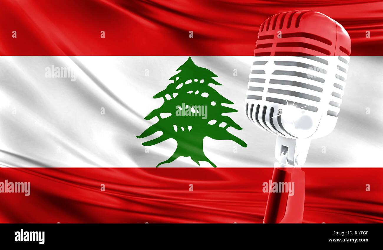 Microphone on fabric background of flag of Lebanon closeup Stock Photo