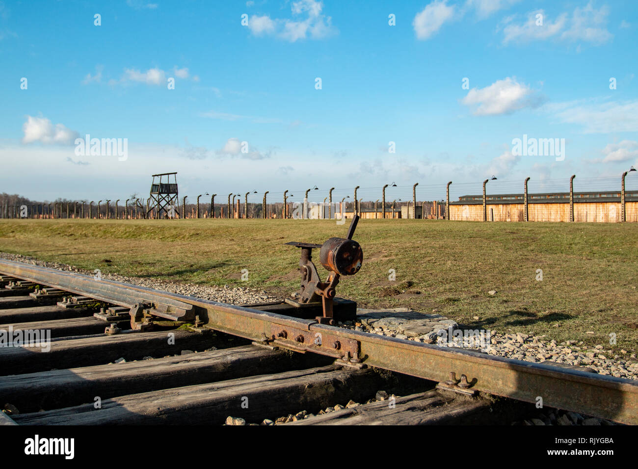 Train tracks in the Auschwitz-Birkenau concentration camp Stock Photo
