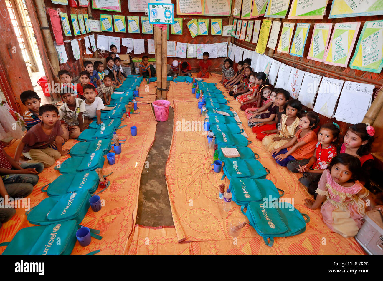 Cox’s bazar, Bangladesh - February 02, 2019: Rohingya refugee children attend class at a temporary school in Balukhali refugee camp at Ukhiya in Cox's Stock Photo
