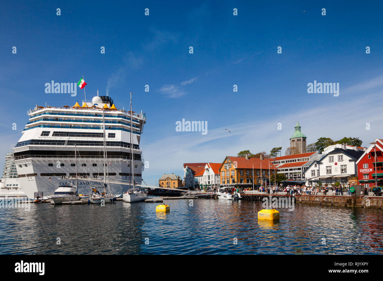 STAVANGER, NORWAY - AUGUST 14, 2018: Costa Favolosa cruise ship moored at Skagenkaien pier in Vagen Harbour of Old Stavanger, a popular tourist destin Stock Photo
