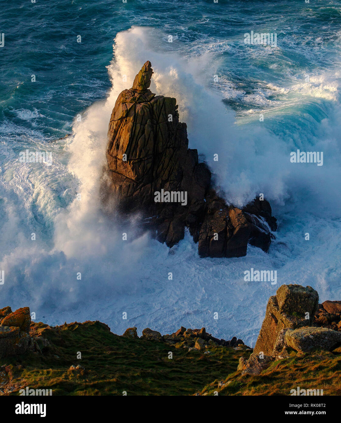 Land's End, Cornwall, UK. 8th February 2019.  Storm Erik thunders into the granite outcrop called The Irish Lady at Land's End, Cornwall.Credit: Mike Newman/Alamy Live News. Stock Photo