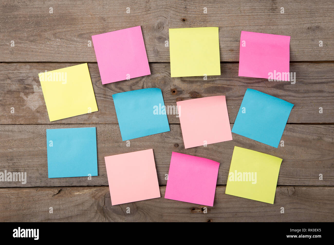 Colorful sticky notes on the blank blackboard Stock Photo