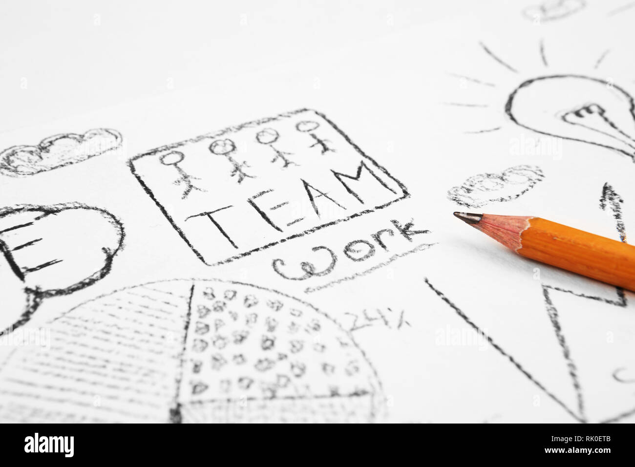 Teamwork words on the paper with sketch Stock Photo