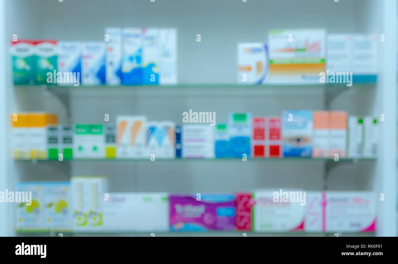 Blurred picture of medicine shelf in drug store. Pharmacy shop interiors. Pharmaceutical products in drugstore. Medical retail shop. Pharmacy Stock Photo