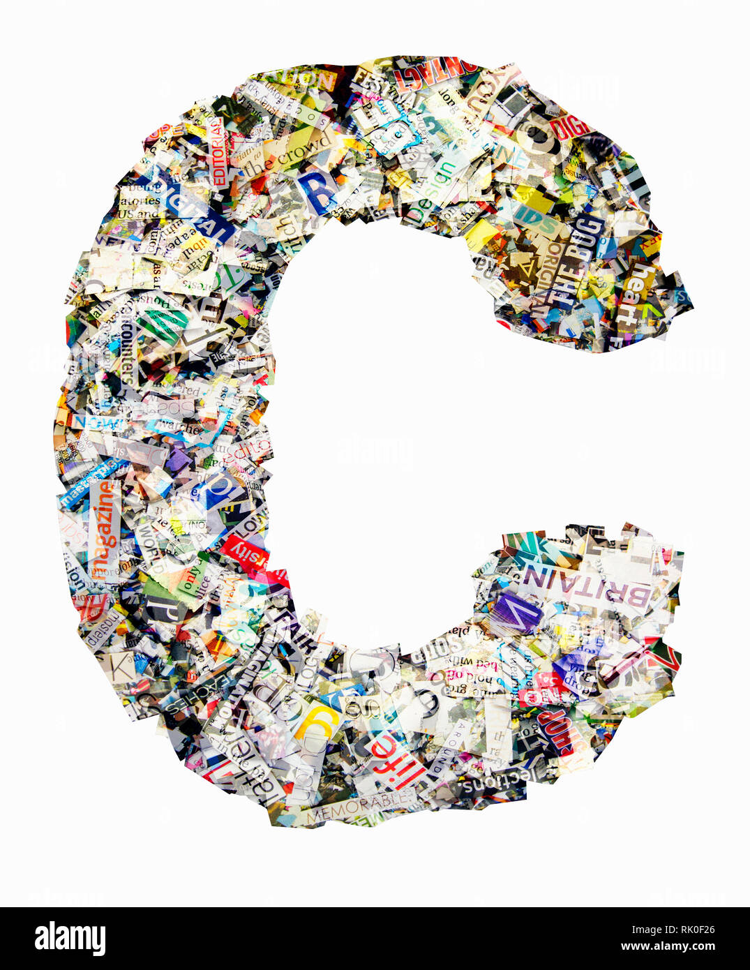 The letter C  made from newspaper confetti Stock Photo