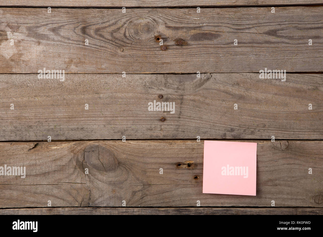 Colorful sticky note on the blank blackboard Stock Photo