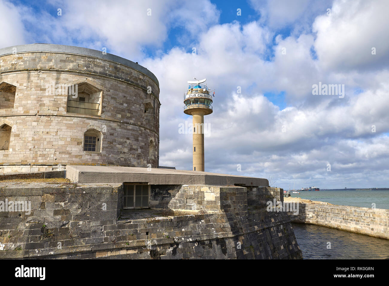 Calshot Castle, First Built By Henry VIII Between 1539 And 1540 To Protect The Solent And Southampton Water, Calshot Tower Lookout Station Behind. Stock Photo