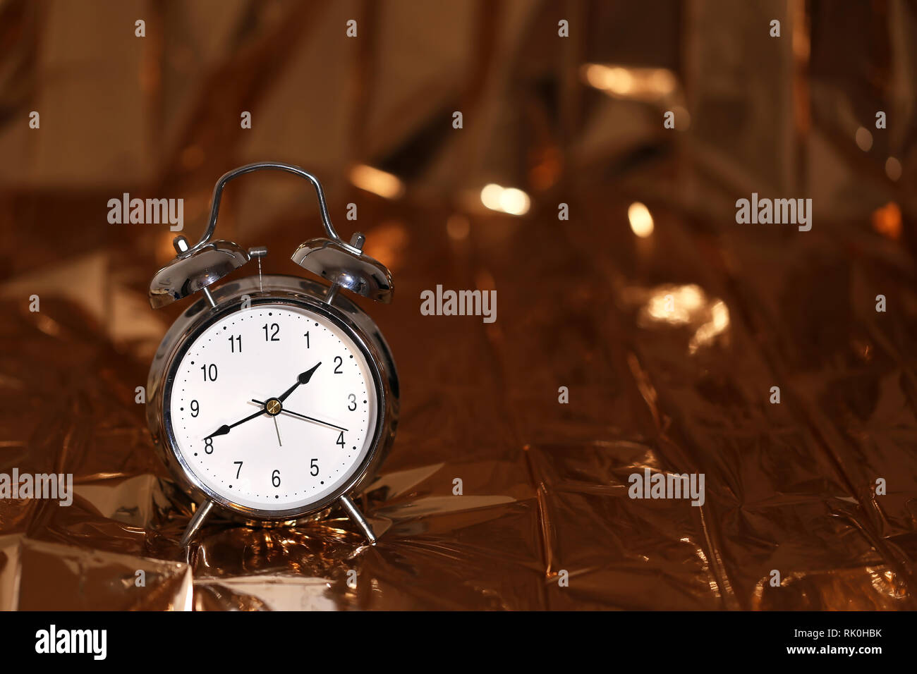The old alarm clock on a light background Stock Photo