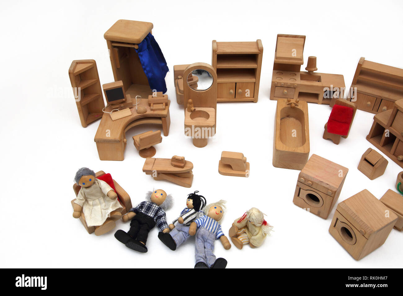 Wooden Dolls House Furniture with Dolls Stock Photo Alamy