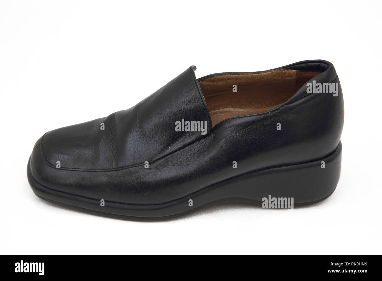 A Black Leather Slip on Shoe Stock Photo