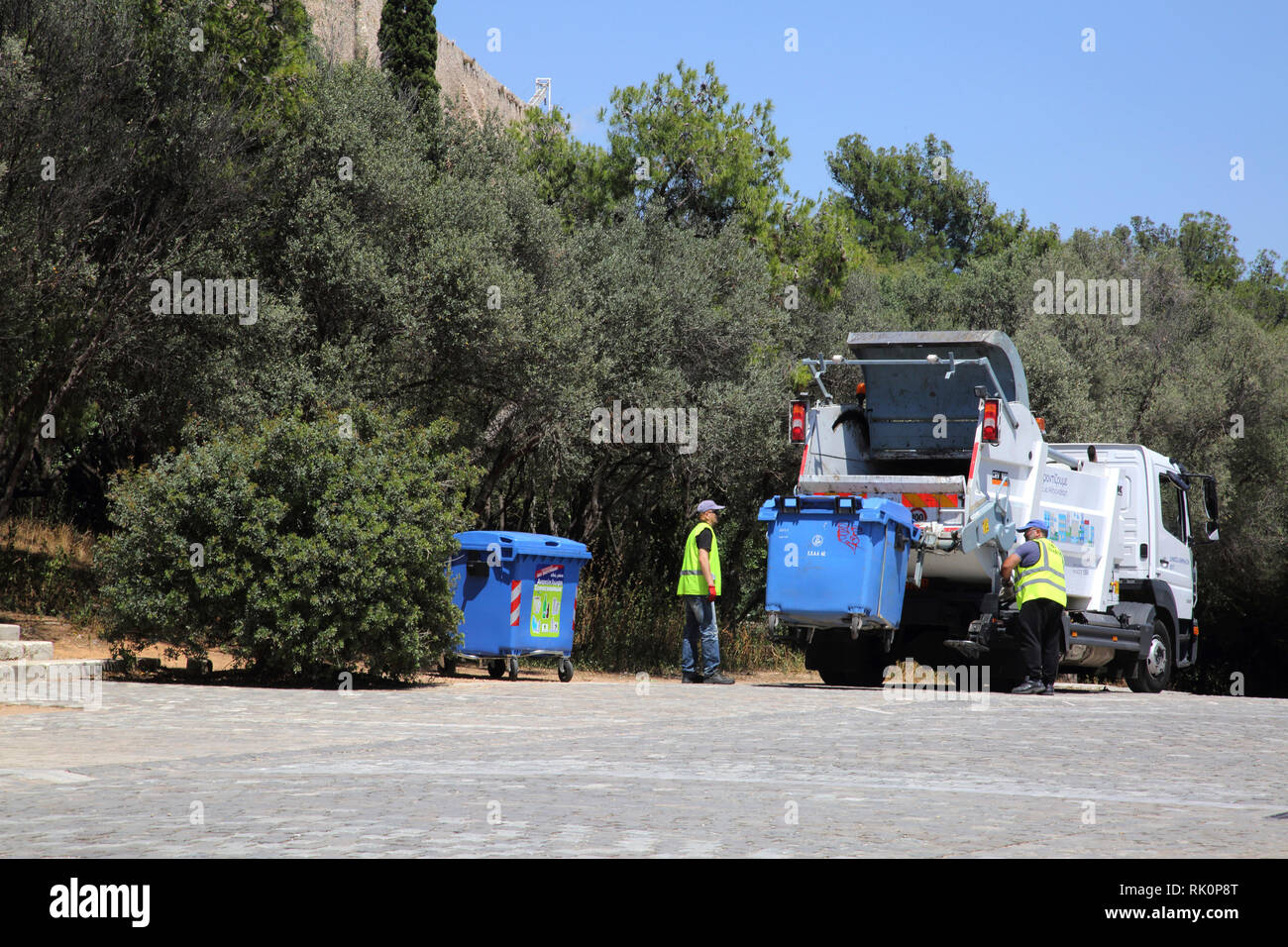 Athens Greece Bin Men Collecting Recycling Bins on Dionysiou Areopagitou Pedestrian Street Stock Photo