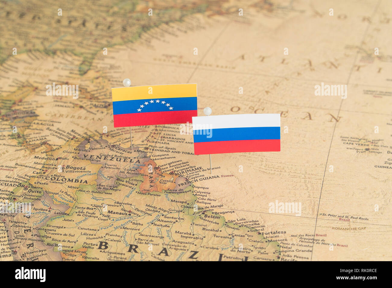 Flags of Russia and Venezuela on the world map. Conceptual photo, politics and world order Stock Photo