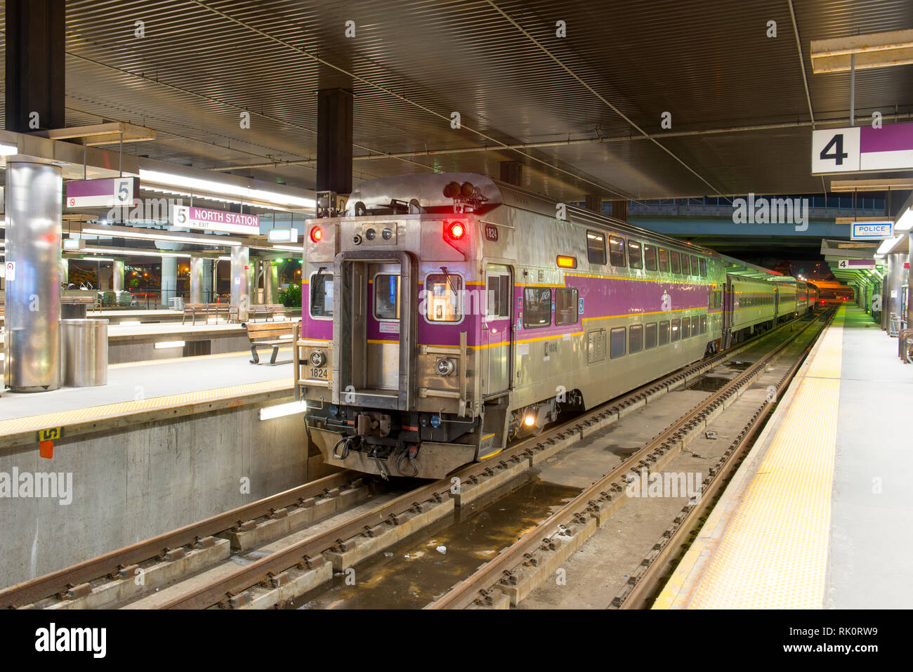 MBTA Commuter Rail bilevel cab car at night in North Station, Boston