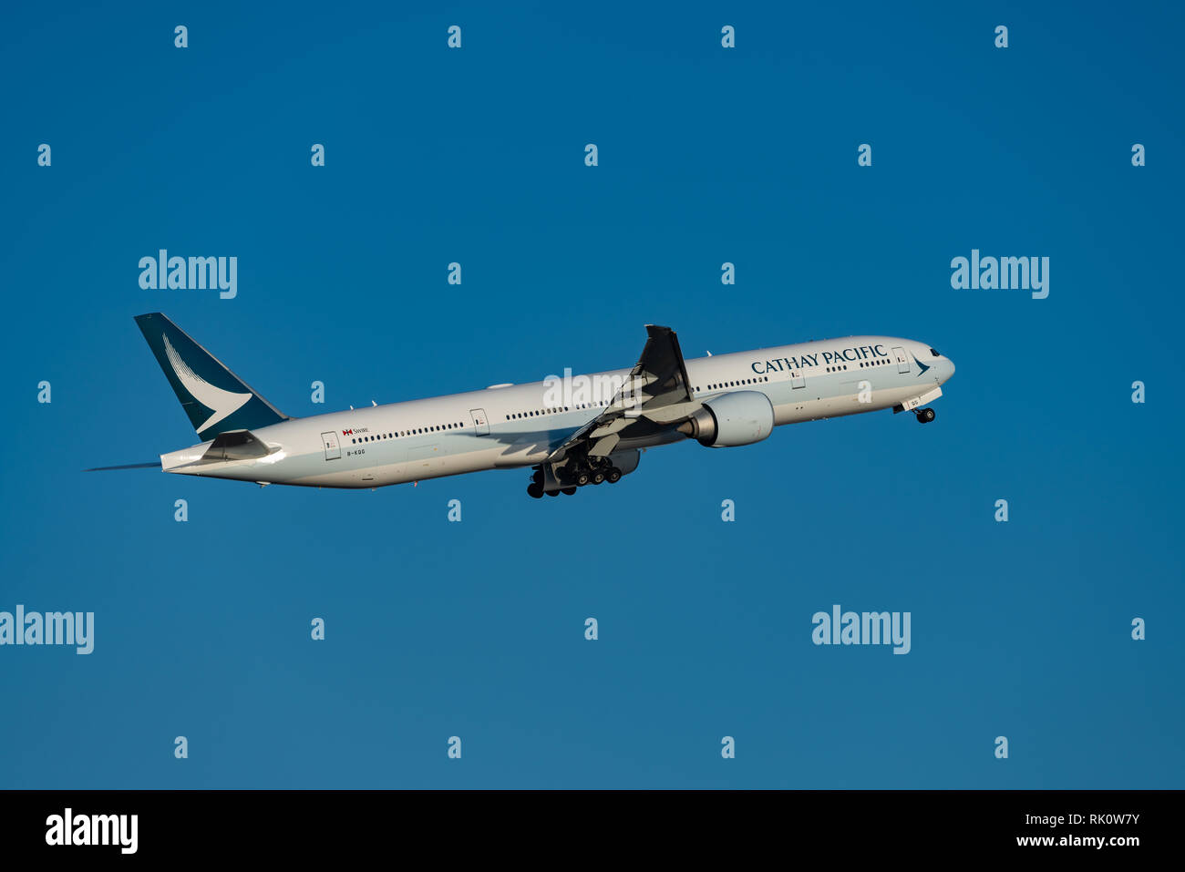 TOKYO, JAPAN - FEB.2, 2019: Cathay Pacific Airways Boeing 777-300ER Tripleseven taking off from the Haneda International Airport in Tokyo, Japan. Stock Photo