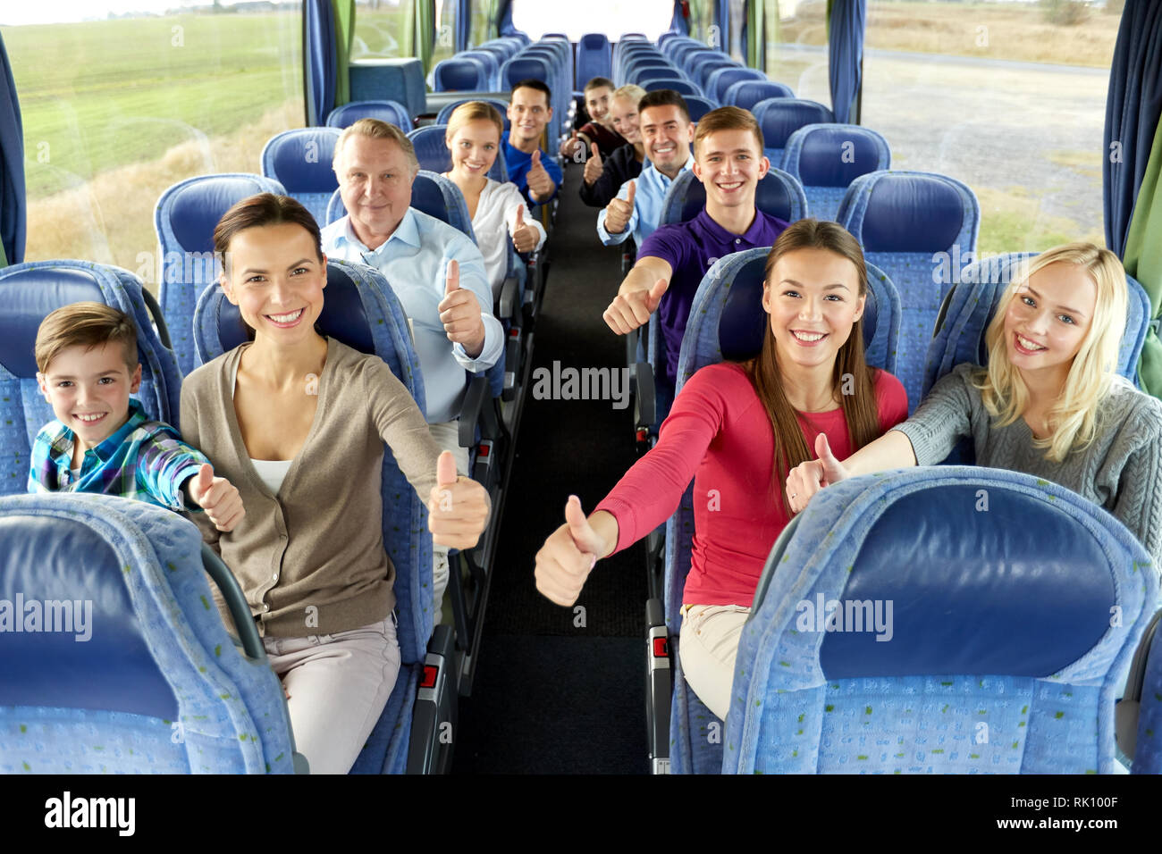 group of happy passengers travelling by bus Stock Photo Alamy
