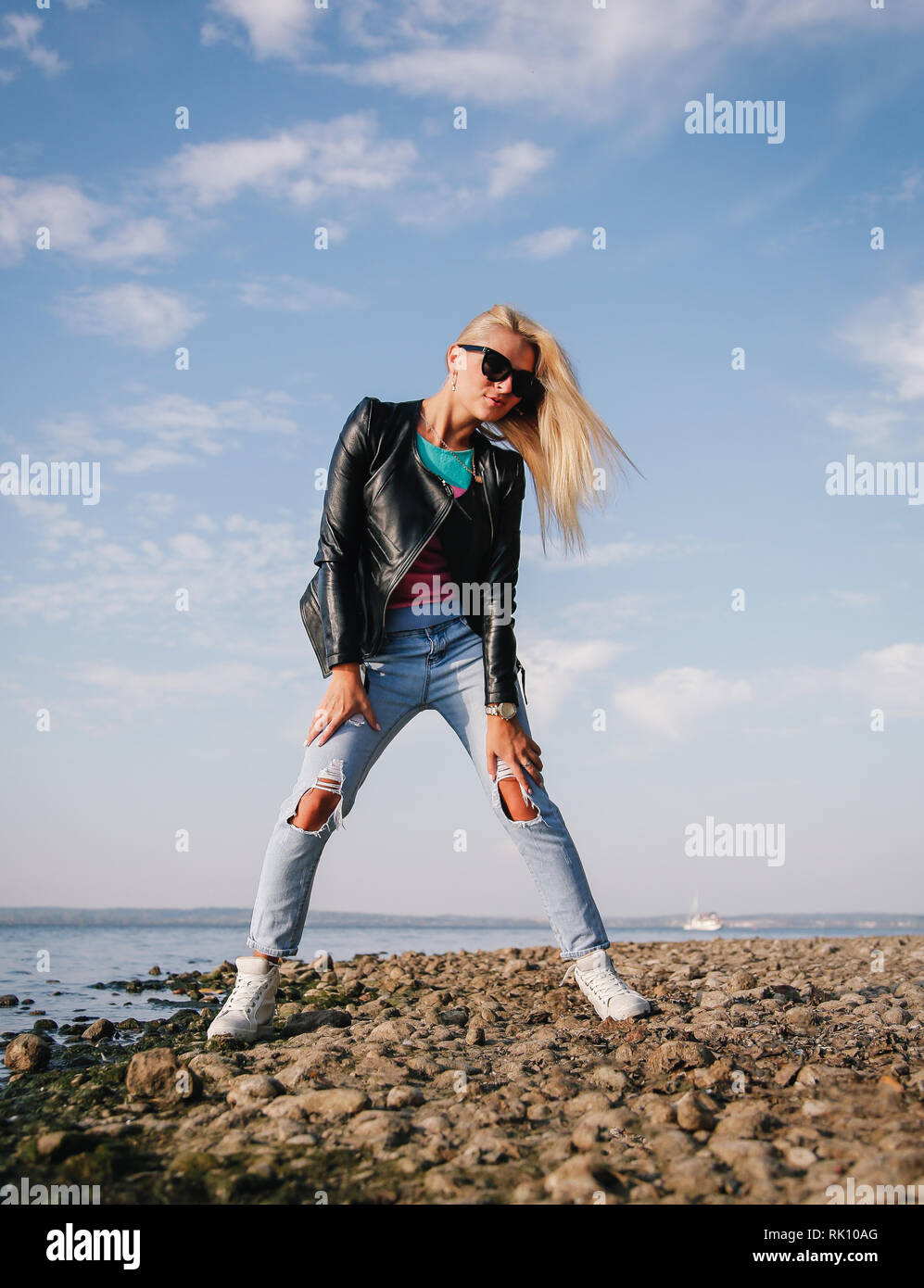 Beautiful Young Blonde In Jeans High Resolution Stock Photography and ...