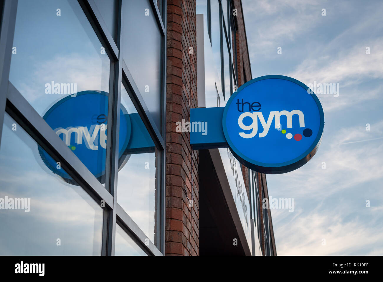 The Gym Group sign on the exterior of a gym in Horsham, West Sussex, UK. Stock Photo