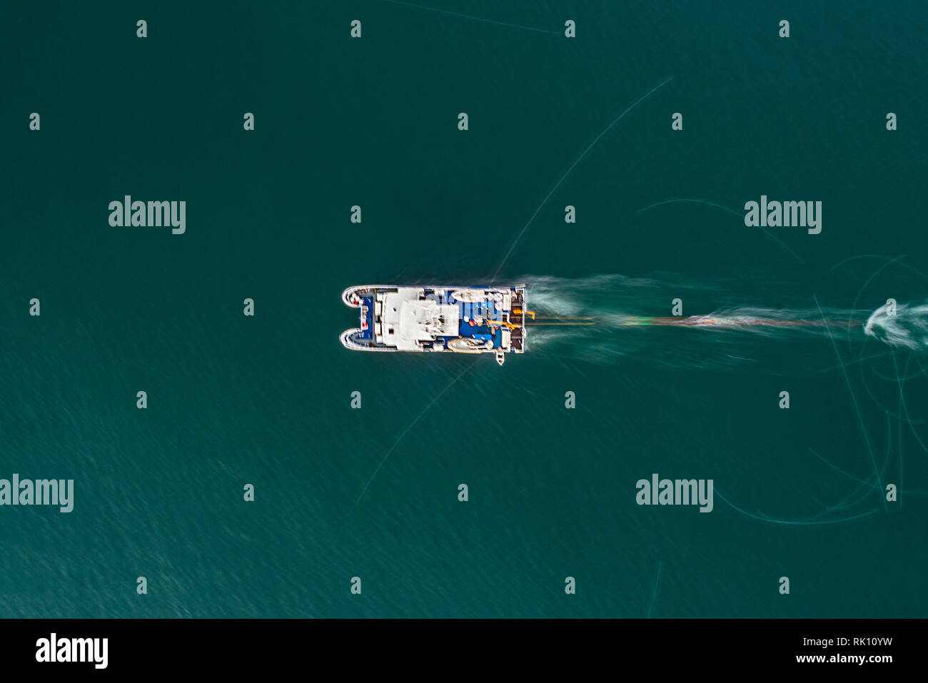 Aerial birds eye view from drone of yacht in deep blue sea.Sozopol ,Bulgaria Stock Photo