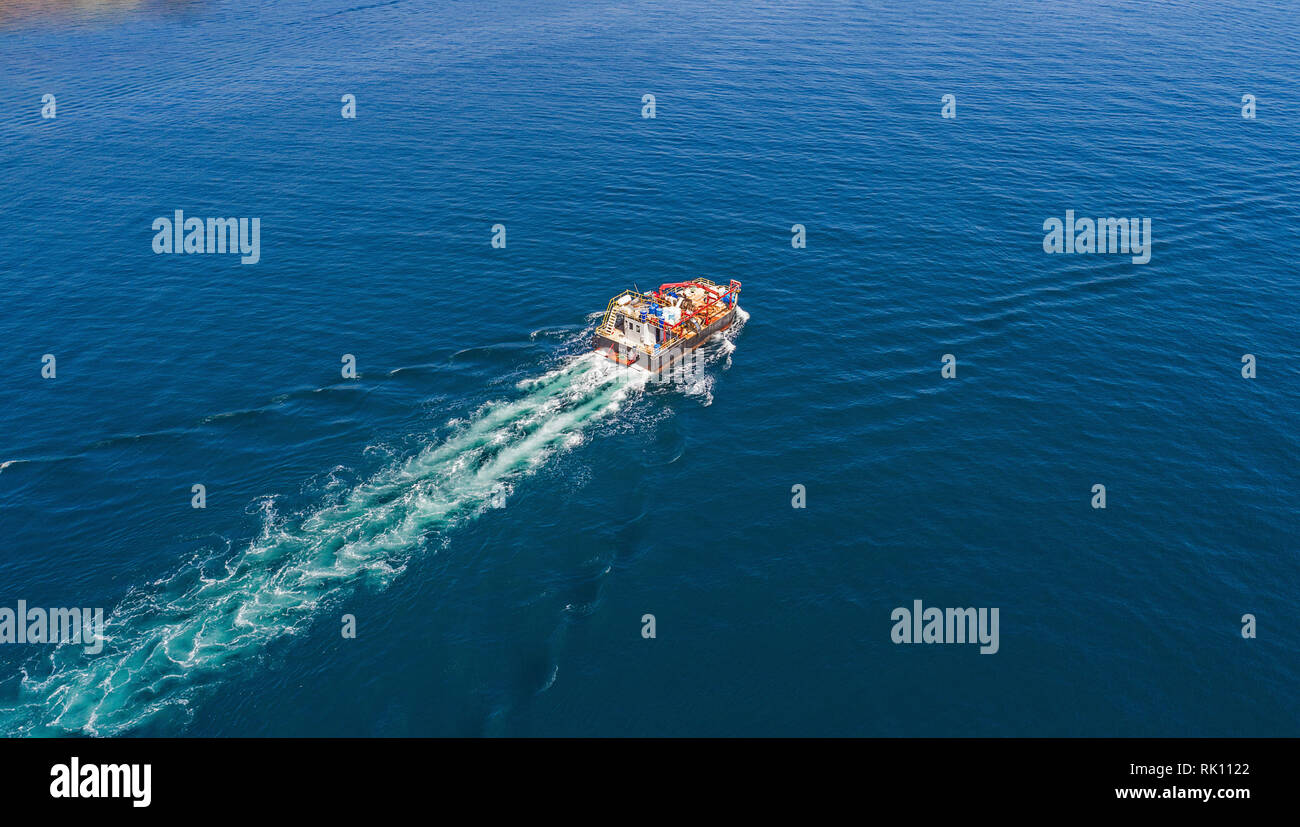 Aerial birds eye view from drone of yacht in deep blue sea.Sozopol ,Bulgaria Stock Photo