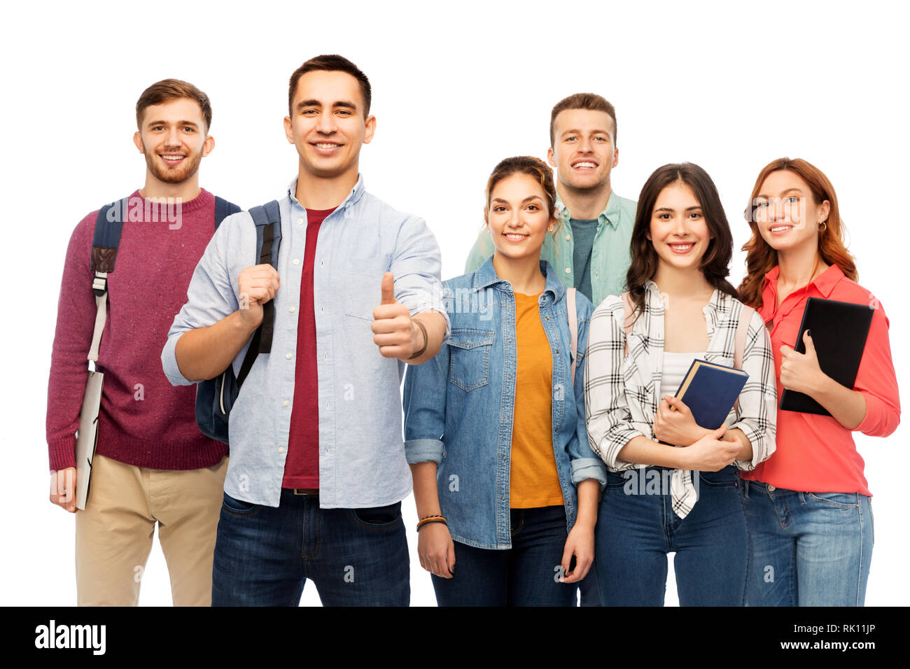 group of smiling students showing thumbs up Stock Photo - Alamy