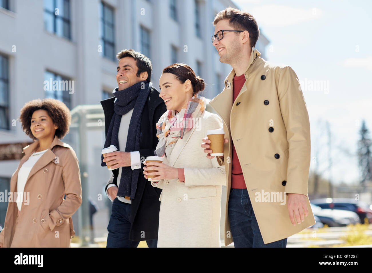 office workers with coffee on city street Stock Photo