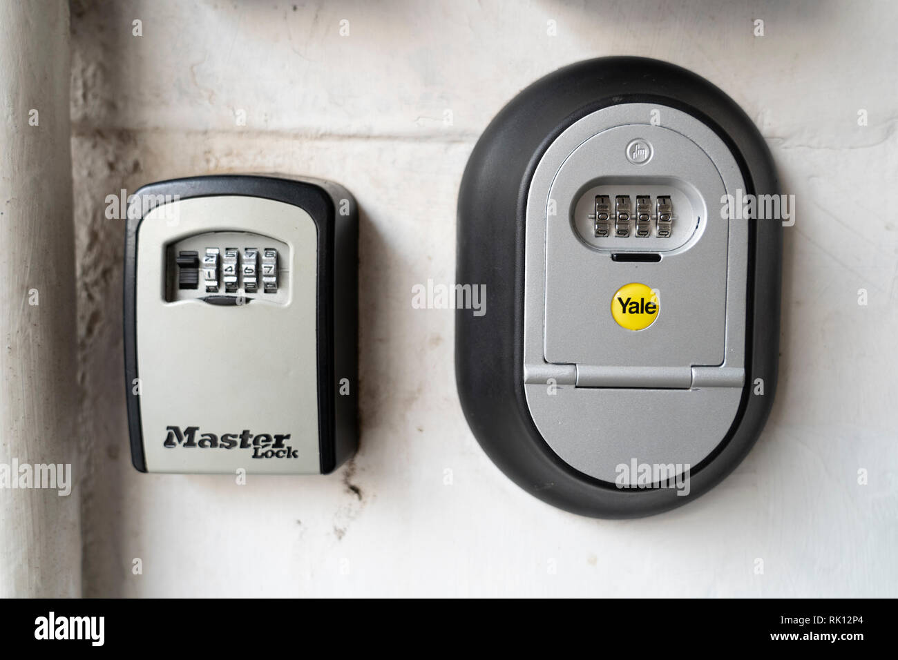 Key boxes for AirbnB guests to access door keys outside apartment building in Edinburgh Old Town, Scotland, UK Stock Photo