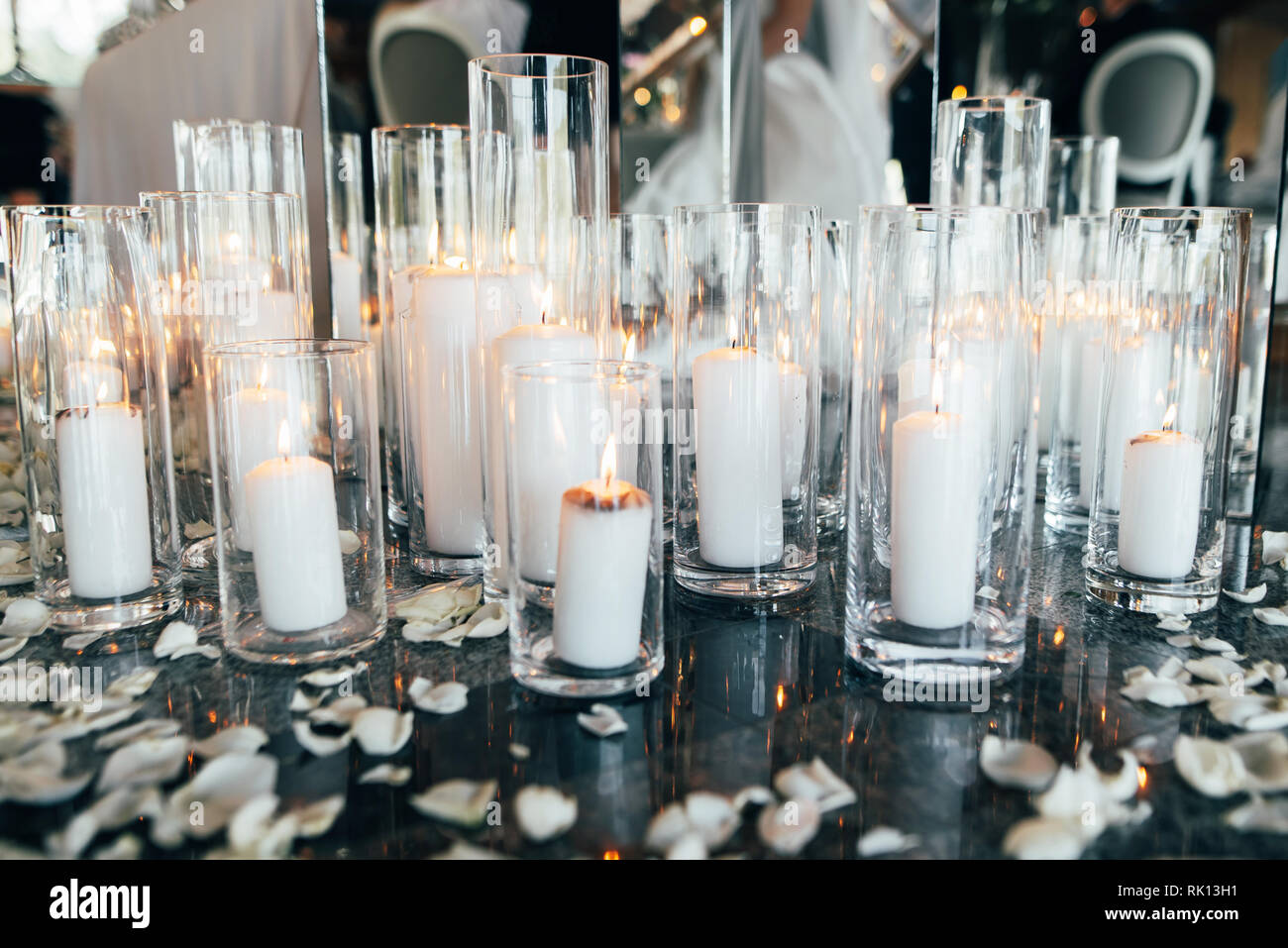 Many candles and flower petals to celebrate the wedding ceremony Stock