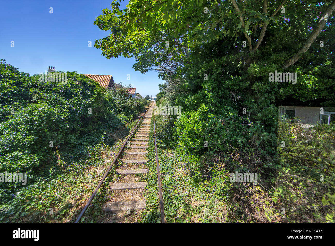 View from the Alderney Railway engine looking along the track toward Mannez. Stock Photo