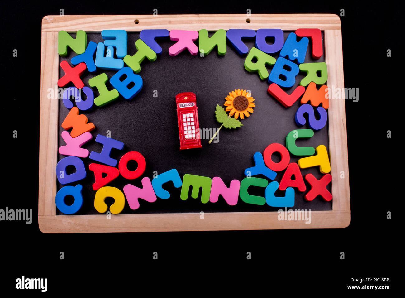 Telephone booth and colorful letters of Alphabet made of wood Stock ...