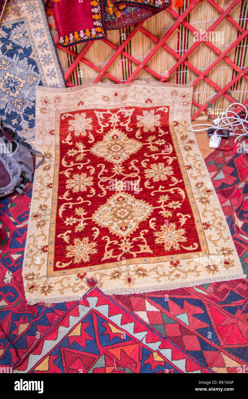 Old hand made carpet and rugs of traditional types Stock Photo Alamy