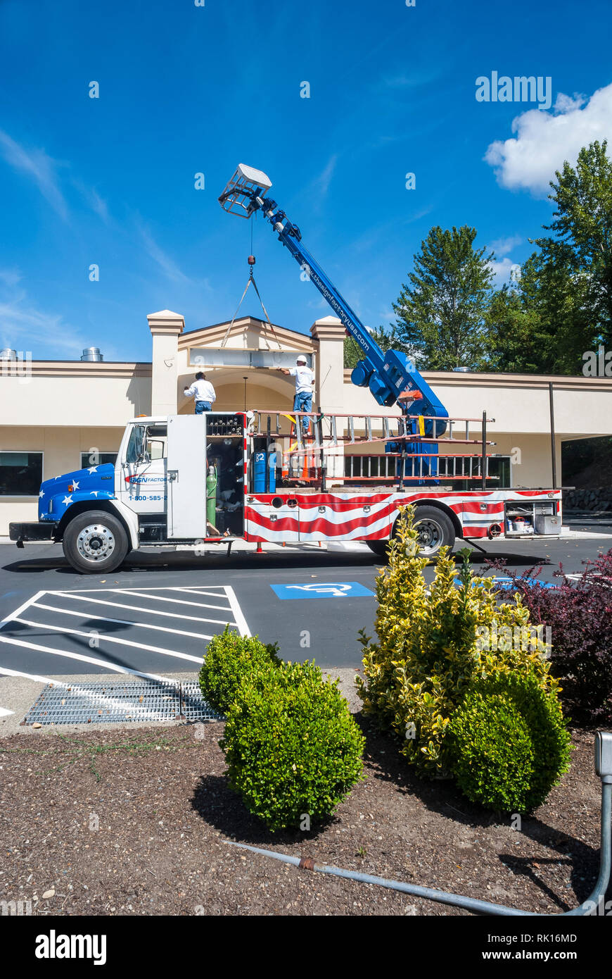 Installing signage hires stock photography and images Alamy