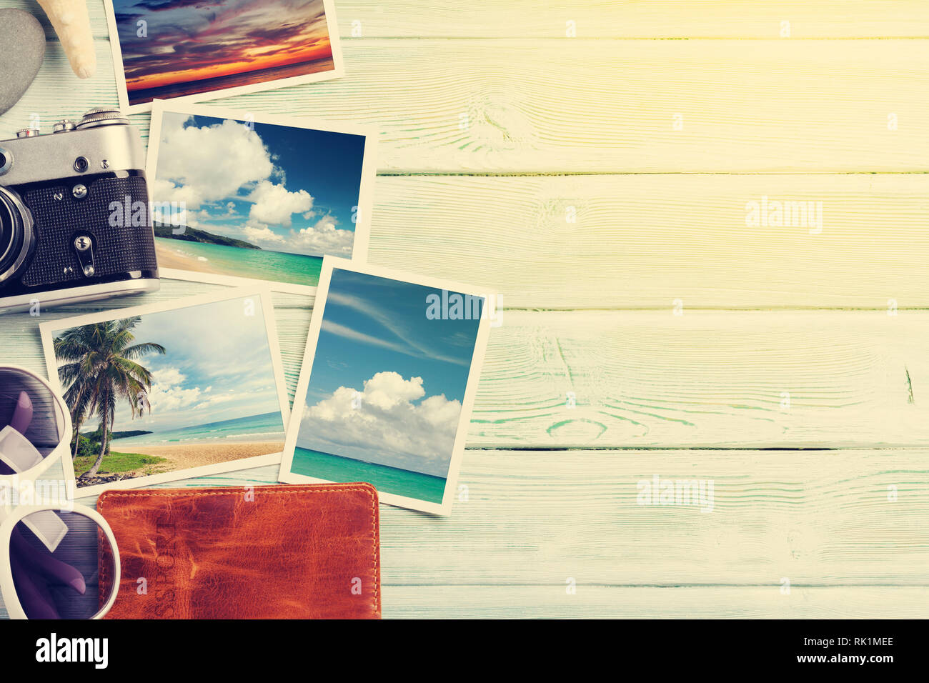 Travel vacation background concept with weekend photos on wooden backdrop. Top view with copy space. Flat lay. All photos taken by me. Sunny toned Stock Photo