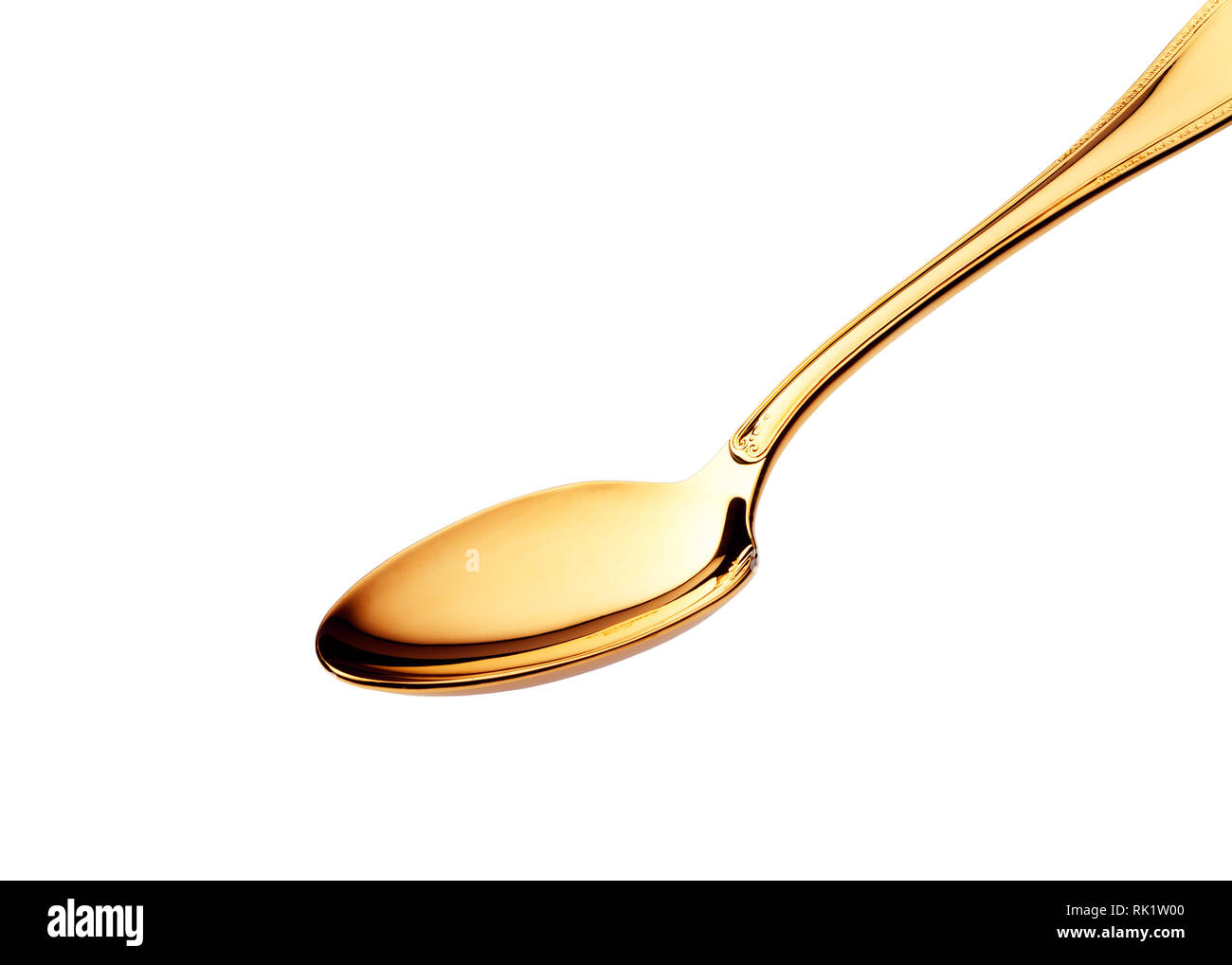 Gold spoon on white hires stock photography and images Alamy