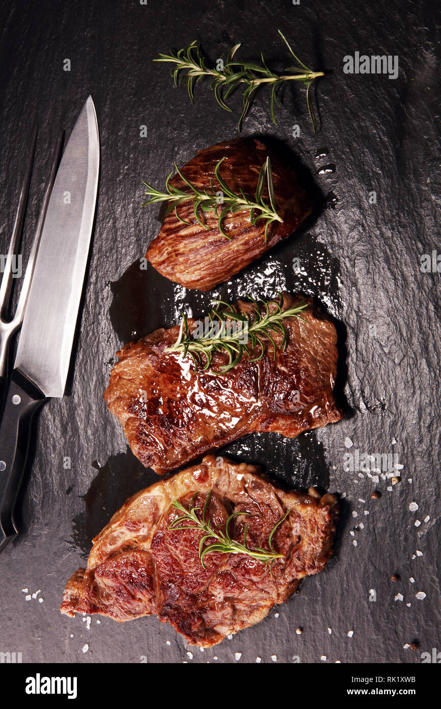 Barbecue Rib Eye Steak. Black Angus Prime meat steaks Machete, Striploin, Rib eye, Tenderloin fillet mignon Stock Photo