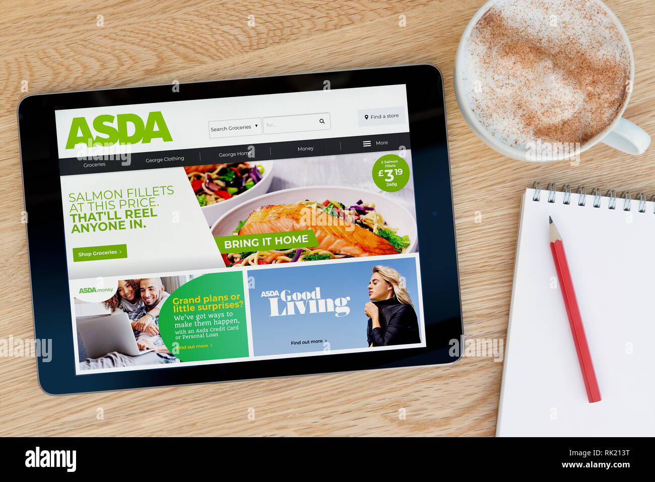 The Asda website features on an iPad tablet device which rests on a