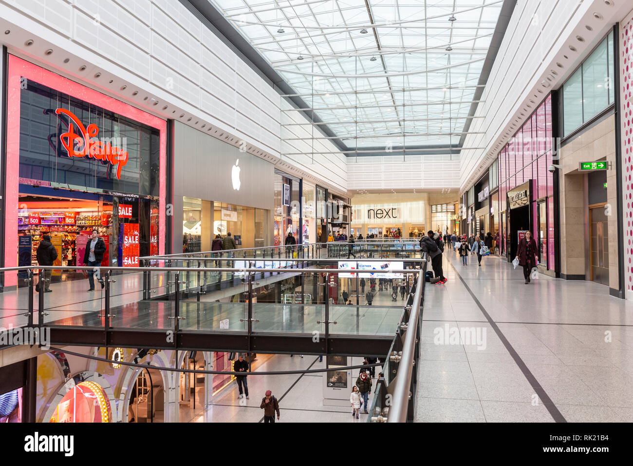 Interior of Manchester arndale shopping centre with Disney store and Next store,Manchester,England Stock Photo