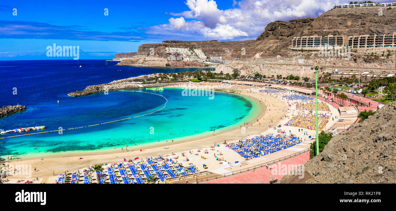Turquoise sea in Playa de los Amadores,Gran Canaria,Spain. Stock Photo