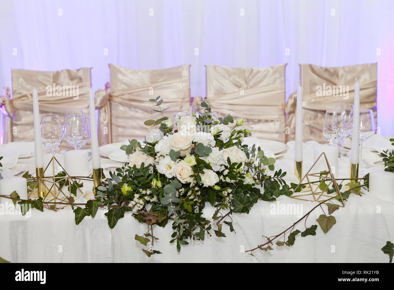 Table set for an event party or wedding reception, luxury elegant table setting dinner Stock Photo