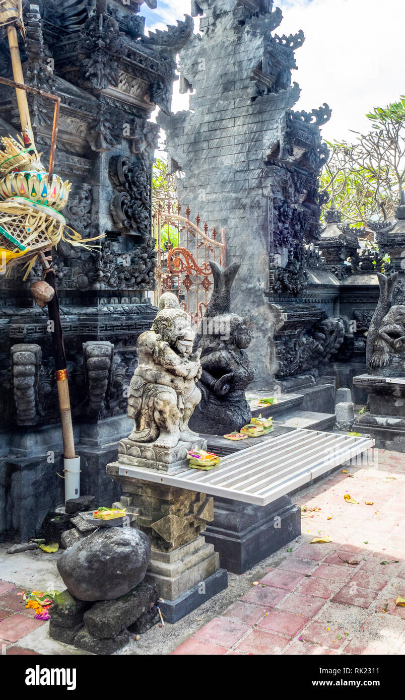 Guardian statue dwarapala bedogol at entrance of Pure Hindu temple Jimbaran, Bali Indonesia. Stock Photo