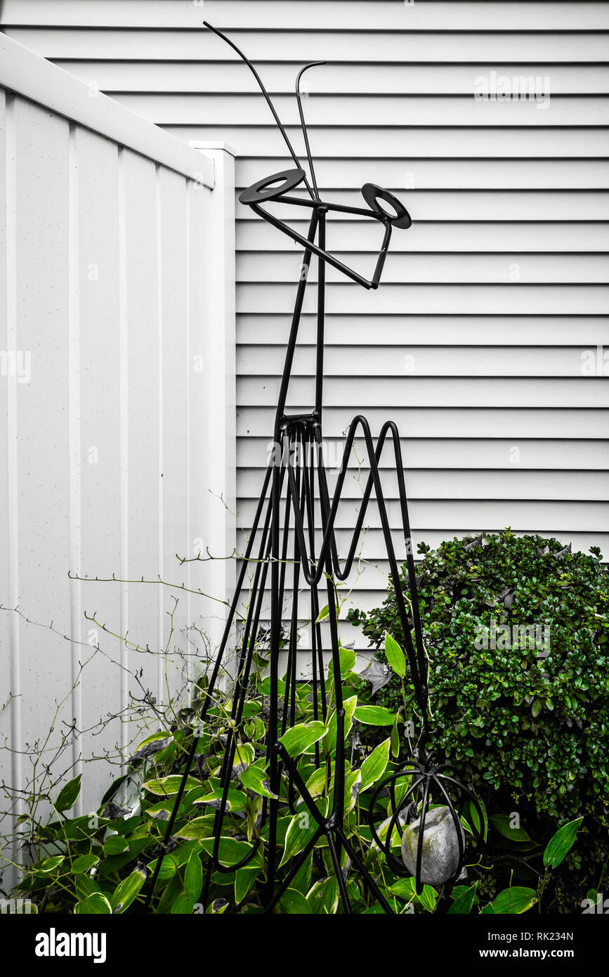 Garden sculpture praying mantis Stock Photo Alamy