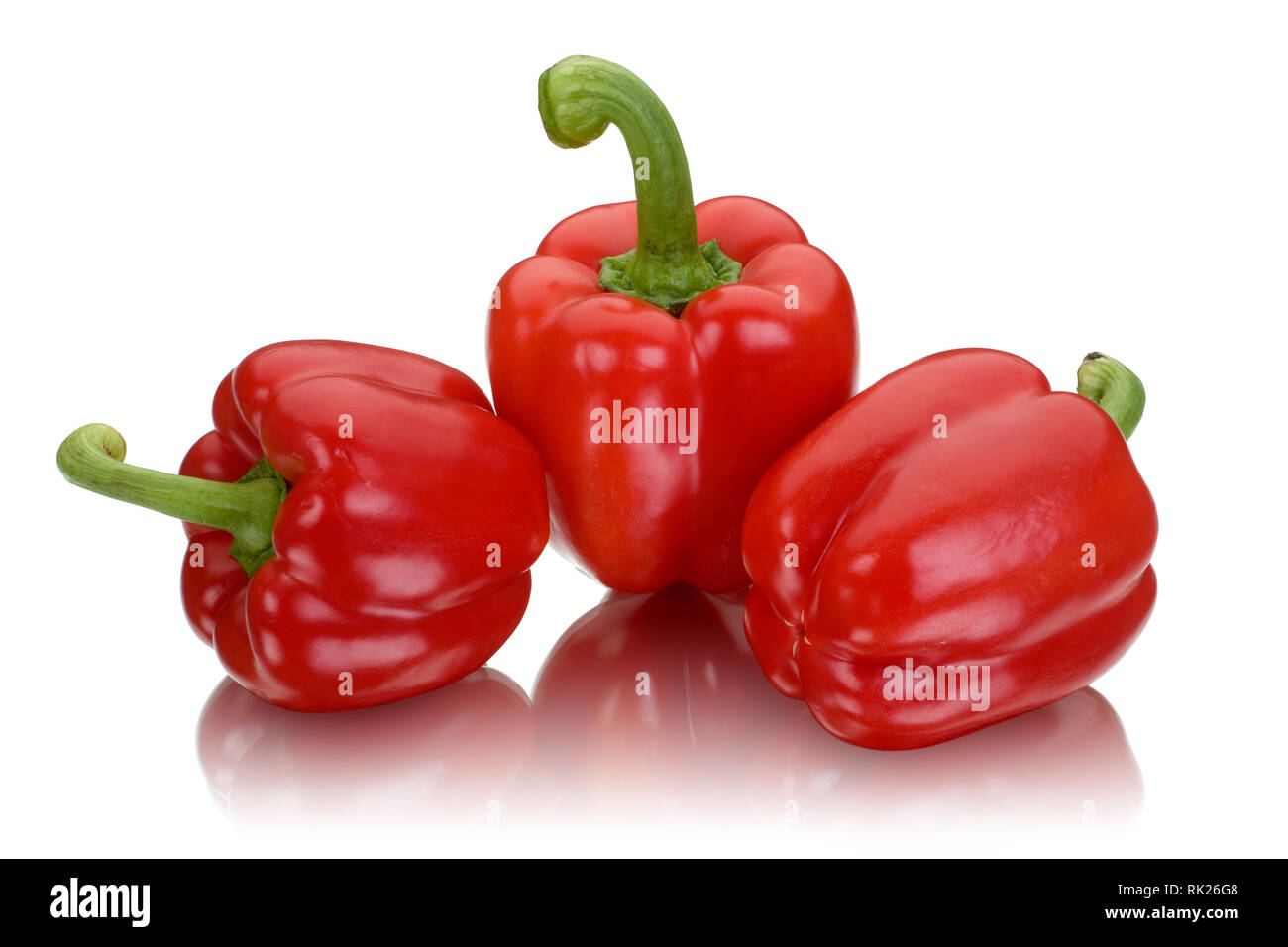 Red bell peppers isolated on white background Stock Photo - Alamy