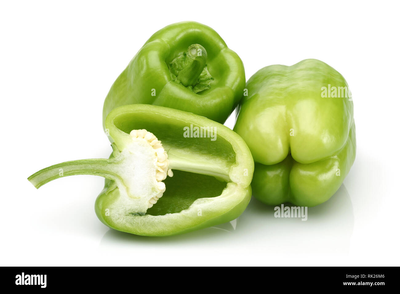 Green bell peppers isolated on white background Stock Photo - Alamy