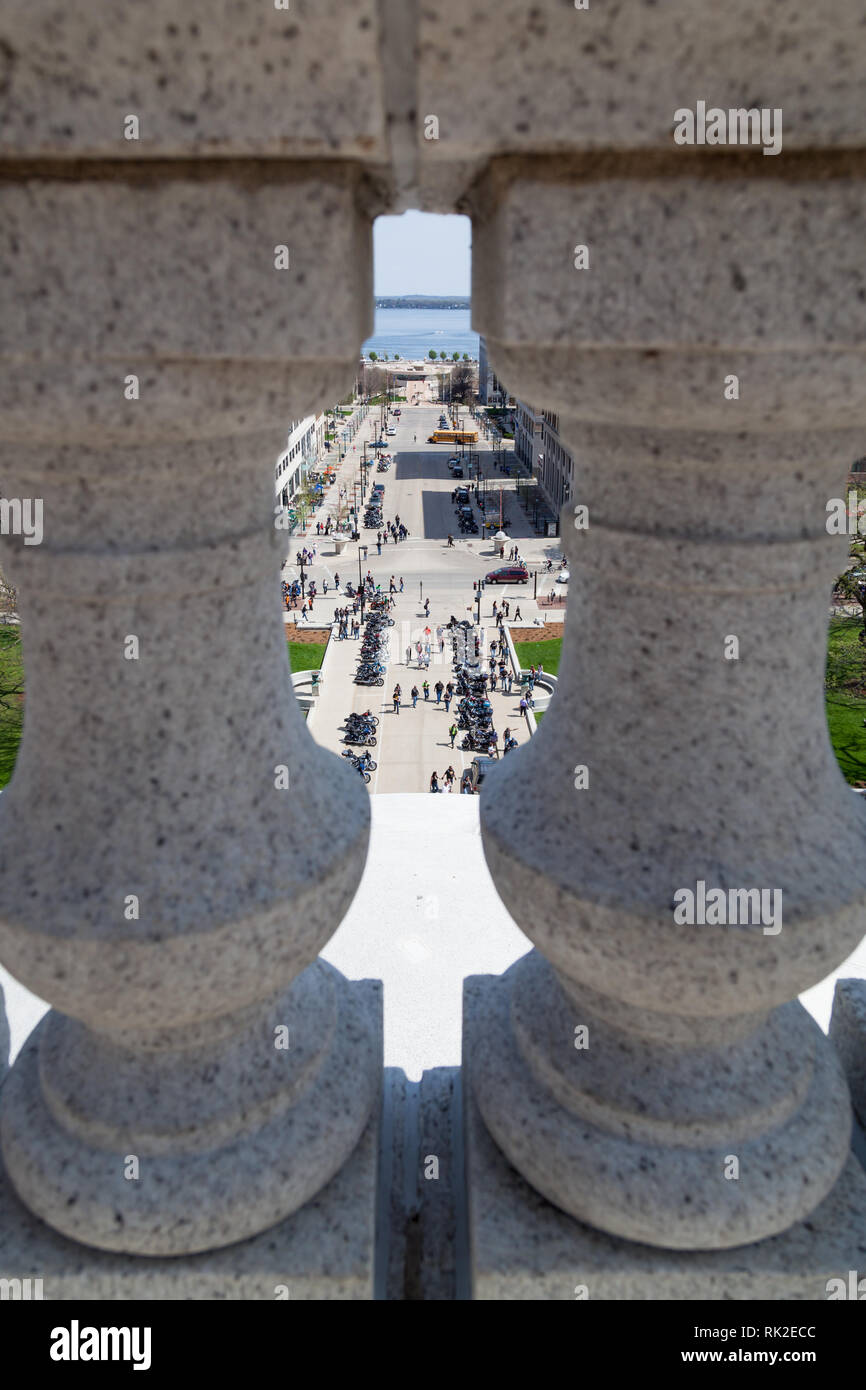 MADISON, WISCONSIN - May 10, 2014: Looking through a roof railing to a ...