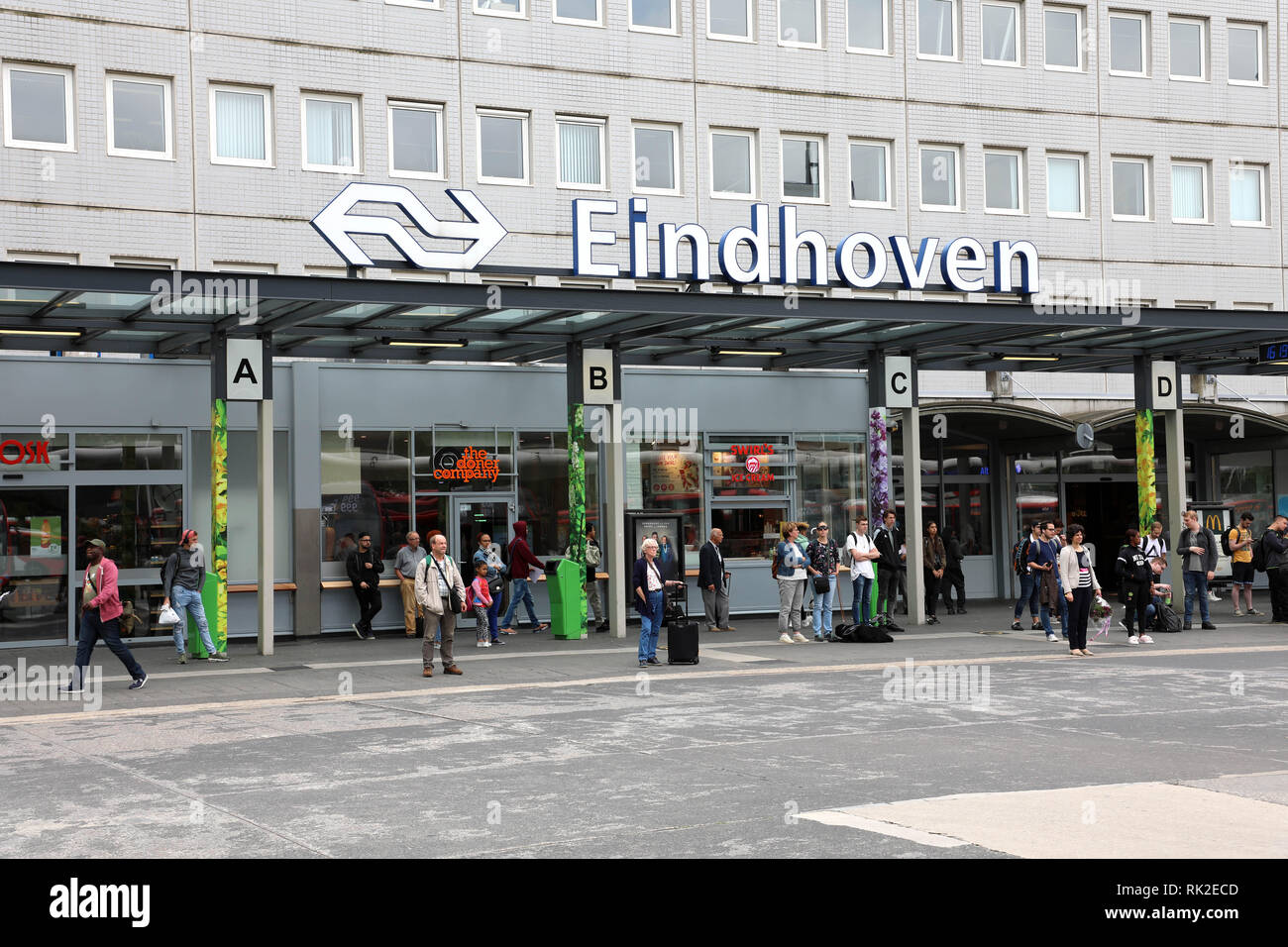 EINDHOVEN, NETHERLANDS JUNE 5, 2018 main train and bus station with commuters in Eindhoven