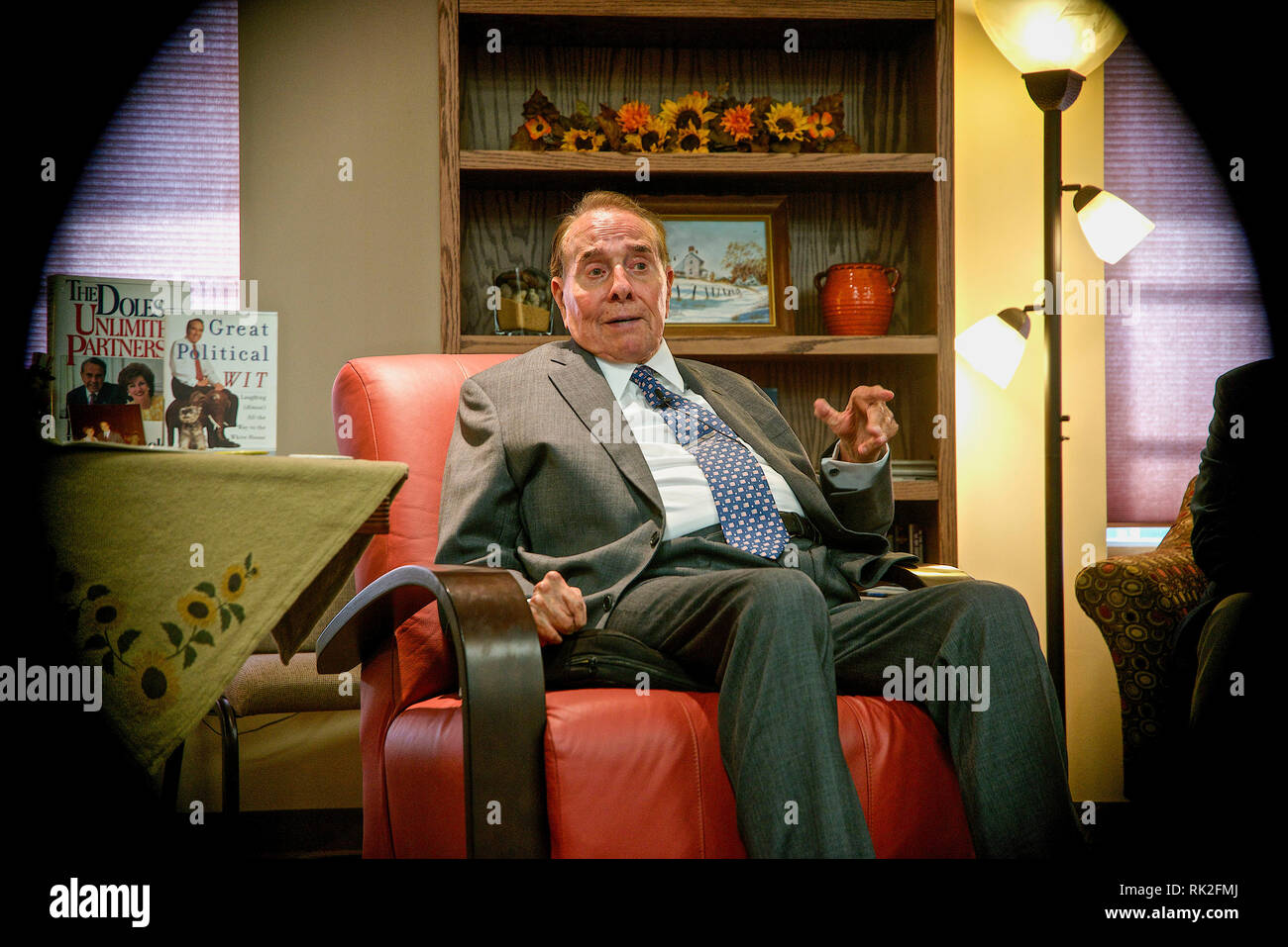 Greensburg, Kansas, USA,September 23, 2014 Former Senator Robert Dole visits with supporters at the Greensburg Senior Center, while Sen. Pat Roberts sits along side of him. Greensburg was destroyed by an F5 tornado in 2007 and now has been rebuilt with massive amount of help from FEMA. Stock Photo