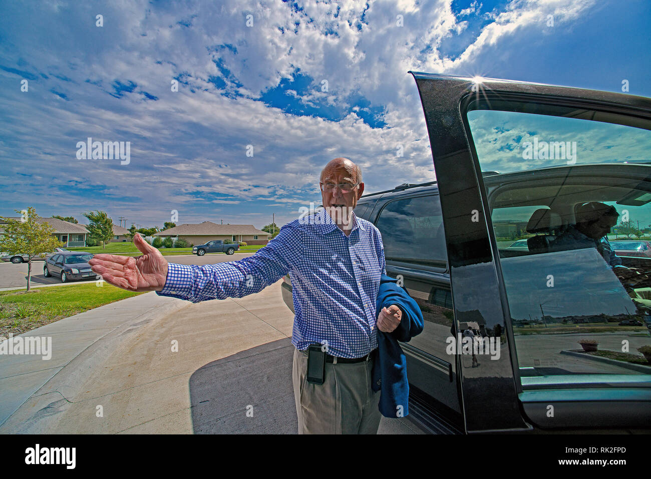 Greensburg, Kansas, USA, September 23, 2014 Senator Pat Roberts gets into his vehicle after visiting with the senior citizens at the Greensburg Senior Center. The Town of Greensburg was destroyed by an F5 tornado in 2007 and now has been rebuilt with massive amounts of help from FEMA. Stock Photo