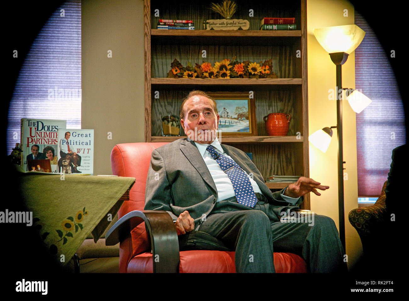 Greensburg, Kansas, USA,September 23, 2014 Former Senator Robert Dole visits with supporters at the Greensburg Senior Center, while Sen. Pat Roberts sits along side of him. Greensburg was destroyed by an F5 tornado in 2007 and now has been rebuilt with massive amount of help from FEMA. Stock Photo