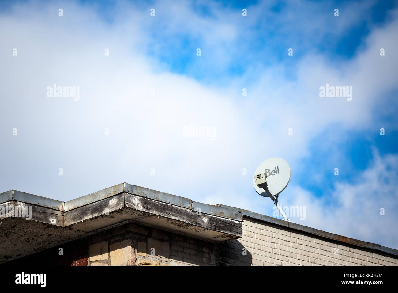 MONTREAL, CANADA - NOVEMBER 8, 2018: Bell Canada logo on a satellite dish  on a house in Montreal, Quebec. Bell is one of biggest telecommunications  Stock Photo - Alamy