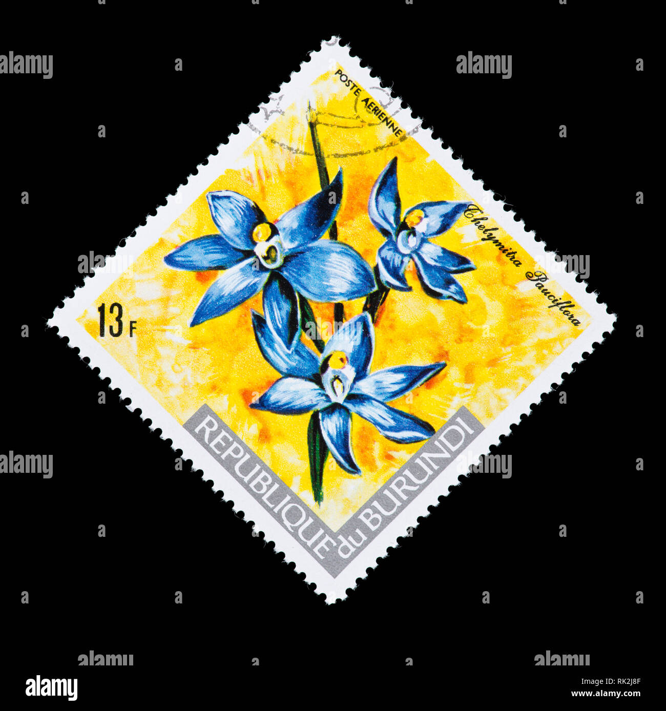 Postage stamp from Burundi depicting a slender sun orchid (Thelymitra pauciflora) Stock Photo